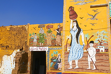 Wall paintings on house in the village of Gourna El Gedida, West Bank of the River Nile, Thebes, Egypt, North Africa, Africa