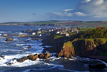 A view of the village of St. Abbs taken from Starney Bay, St. Abb's Nature Reserve, Berwickshire, Scotland, United Kingdom, Europe