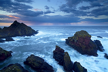 Stormy conditions on a spring evening at Horsecastle Bay, St. Abb's Head Nature Reserve, Berwickshire, Scotland, United Kingdom, Europe