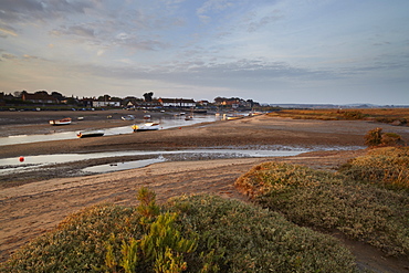 Beautiful early morning light looking across the saltmarshes towards Burnham Overy Staithe, Norfolk, England, United Kingdom, Europe