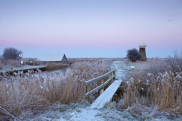 A frosty morning in the Norfolk Broads showing the mill and staithe at West Somerton, Norfolk, England, United Kingdom, Europe