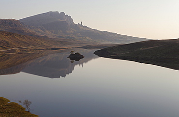 The Storr reflected in the calm waters of Loch Fada, Trotternish, Isle of Skye, Scotland, United Kingdom, Europe