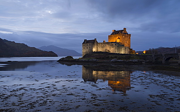 A twilight view of Eilean Donan Castle, Highlands, Scotland, United Kingdom, Europe