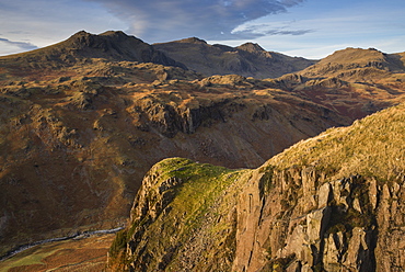 Late evening light on the Scafells from above Hardknott Fort, Lake District National Park, Cumbria, England, United Kingdom, Europe