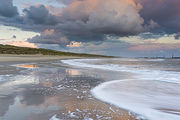 A beautiful cloudscape and wild sea at Waxham, Norfolk, England, United Kingdom, Europe