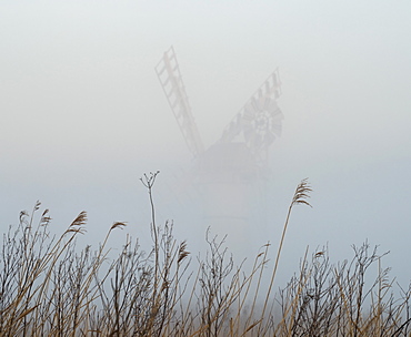 Thurne Mill viewed through the mist at Thurne, Norfolk, England, United Kingdom, Europe