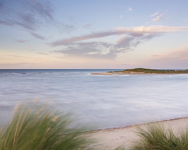 A high tide on a windy evening at Holkham Bay, Norfolk, England, United Kingdom, Europe