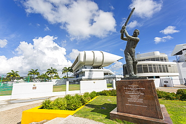 Garfield Sobers statue and The Kensington Oval Cricket Ground, Bridgetown, St. Michael, Barbados, West Indies, Caribbean, Central America