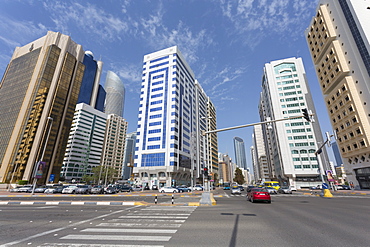 Road junction and tall buildings on Hamdan Bin Mohammed Street, Abu Dhabi, United Arab Emirates, Middle East