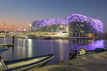 The Yas Viceroy Hotel and Yas Marina at dusk, Yas Island, Abu Dhabi, United Arab Emirates, Middle East