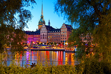 Gamla Stan and Riddarholmen with spire of Riddarholmskyrkan (Riddarholmen Church) at dusk, Stockholm, Sweden, Scandinavia, Europe