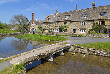 Cottages, Old MIll Museum and bridge over the River Eye in Lower Slaughter, Cotswolds, Gloucestershire, England, United Kingdom, Europe