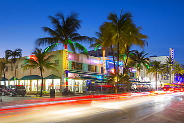 Ocean Drive restaurants and Art Deco architecture at dusk, South Beach, Miami Beach, Miami, Florida, United States of America, North America