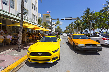 Ocean Drive, yellow cars and Art Deco architecture, Miami Beach, Miami, Florida, United States of America, North America