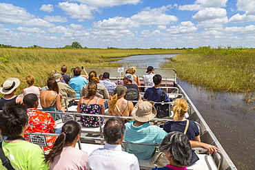 Tourists onboard airboat in the Everglades Safari Park, Miami, Florida, United States of America, North America