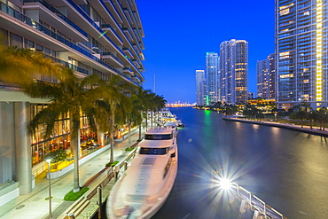 City skyscrapers and Miami River at dusk in Downtown Miami, Miami, Florida, United States of America, North America