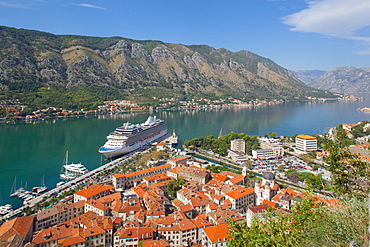 View over Old Town and cruise ship in Port, Kotor, UNESCO World Heritage Site, Montenegro, Europe