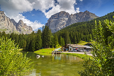 Lake near Hotel Lupo Bianco Wellness and  Walking Canazei, Passo Pordoi with mountain backdrop, South Tyrol, Italian Dolomites, Italy, Europe