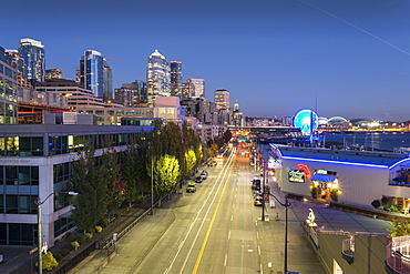 Elevated view of Seattle skyline and traffic on Alaskan Way at dusk, Belltown District, Seattle, Washington State, United States of America, North America