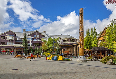 Totem Pole and shops on Whistler Olympic Plaza and Village Stroll, Whistler Village, British Columbia, Canada, North America