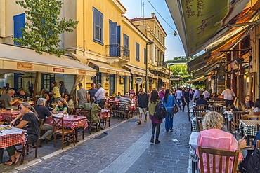 View of restaurants and cafes on Mitropleos during late afternoon, Athens, Greece, Europe