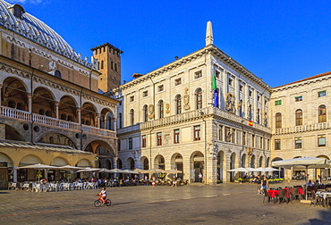 View of Tower of Anziani and Ragione Palace visible on the left in Piazza delle Erbe, Padua, Veneto, Italy, Europe