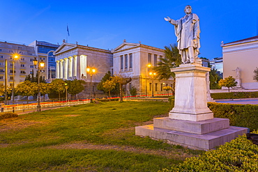 View of the statue and National Library of Greece at dusk, Athens, Greece, Europe