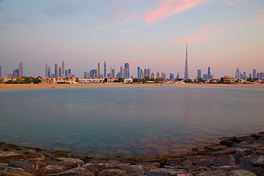 Burj Khalifa and city skyline at sunset, Jumeirah Beach, Dubai, United Arab Emirates, Middle East