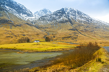 Isolated cottage in the Glencoe Valley during winter snow storm, Glencoe, Highland Region, Scotland, United Kingdom, Europe