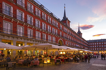 View of restaurants in Plaza Mayor at dusk, Madrid, Spain, Europe