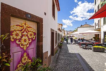 View of back street and beautifully painted door, Funchal, Madeira, Portugal, Europe