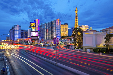 View of the Paris Eiffel Tower and Ballys Hotel and Casino at dusk, The Strip, Las Vegas Boulevard, Las Vegas, Nevada, United States of America, North America