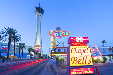 View of Chapel of the Bells and Stratosphere Tower at dusk, The Strip, Las Vegas Boulevard, Las Vegas, Nevada, United States of America, North America