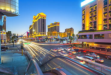 View of traffic and trail lights on The Strip at dusk, Las Vegas Boulevard, Las Vegas, Nevada, United States of America, North America