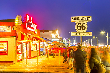 View of shops and Route 66 End of Trail sign on Santa Monica Pier, Santa Monica, Los Angeles, California, United States of America, North America