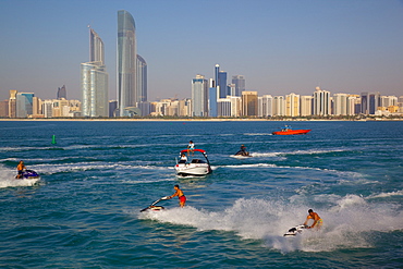 View of city from Marina and Jet ski Water sport, Abu Dhabi, United Arab Emirates, Middle East