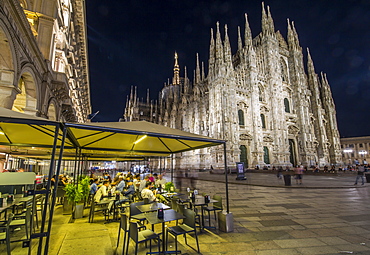 View of Duomo di Milano illuminated at night from Galleria Vittorio Emanuele II in Piazza Del Duomo at dusk, Milan, Lombardy, Italy, Europe