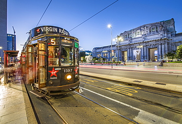 City tram outside Milan Central Station at dusk, Milan, Lombardy, Italy, Europe