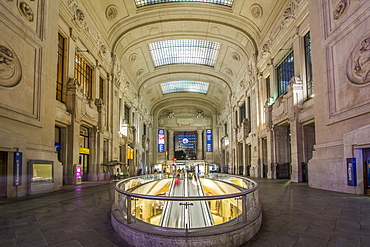 View of interior of Milan Central Station at dusk, Milan, Lombardy, Italy, Europe