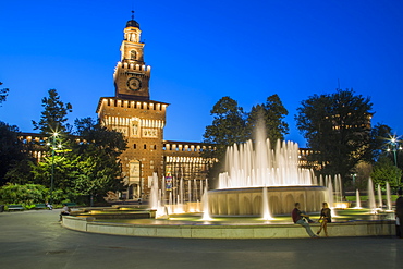 View of Castello Sforzesco (Sforza Castle) and fountains at dusk, Milan, Lombardy, Italy, Europe