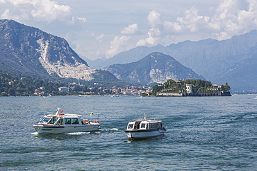 View of taxi boats returning from Isola Bella, Borromean Islands from Stresa, Lago Maggiore, Piedmont, Italian Lakes, Italy, Europe