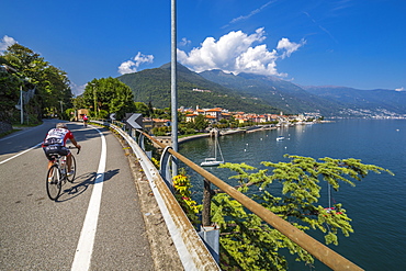 Cyclists on road leading to Cannobio and Lake Maggiore, Lake Maggiore, Piedmont, Italian Lakes, Italy, Europe