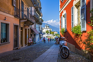 View of cobbled street and Santuario della SS Pieta Church in Cannobio, Lake Maggiore, Piedmont, Italian Lakes, Italy, Europe