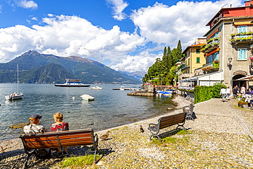 View of visitors on the lakeside in Vezio, Province of Como, Lake Como, Lombardy, Italian Lakes, Italy, Europe