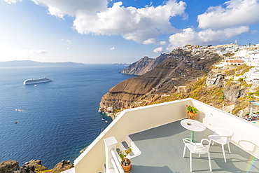 View of Fira white washed houses and cruise ship, Firostefani, Santorini (Thira), Cyclades Islands, Greek Islands, Greece, Europe