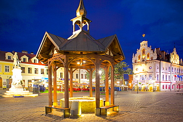 City Hall and well at dusk, Market Square, Old Town, Rzeszow, Poland, Europe