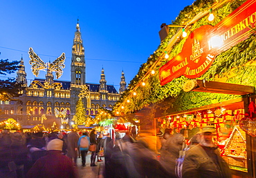 Rathaus and Christmas market stalls at night in Rathausplatz, Vienna, Austria, Europe