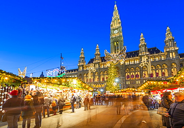 Rathaus and Christmas market stalls at night in Rathausplatz, Vienna, Austria, Europe