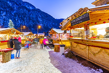 Christmas market at sunset in Campitello di Fassa, Val di Fassa, Trentino, Italy, Europe