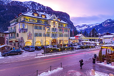 View of Hotel Dolomiti Canazei at dusk in winter, Canazei, Val di Fassa, Trentino, Italy, Europe